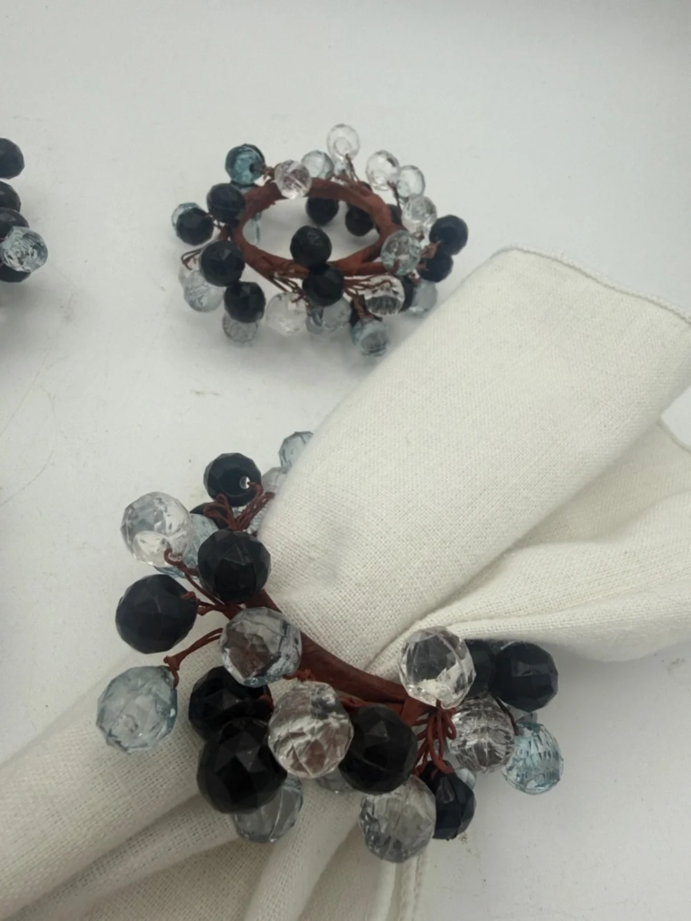 Cluster of  black / clear beaded Napkin Rings holders set of 4